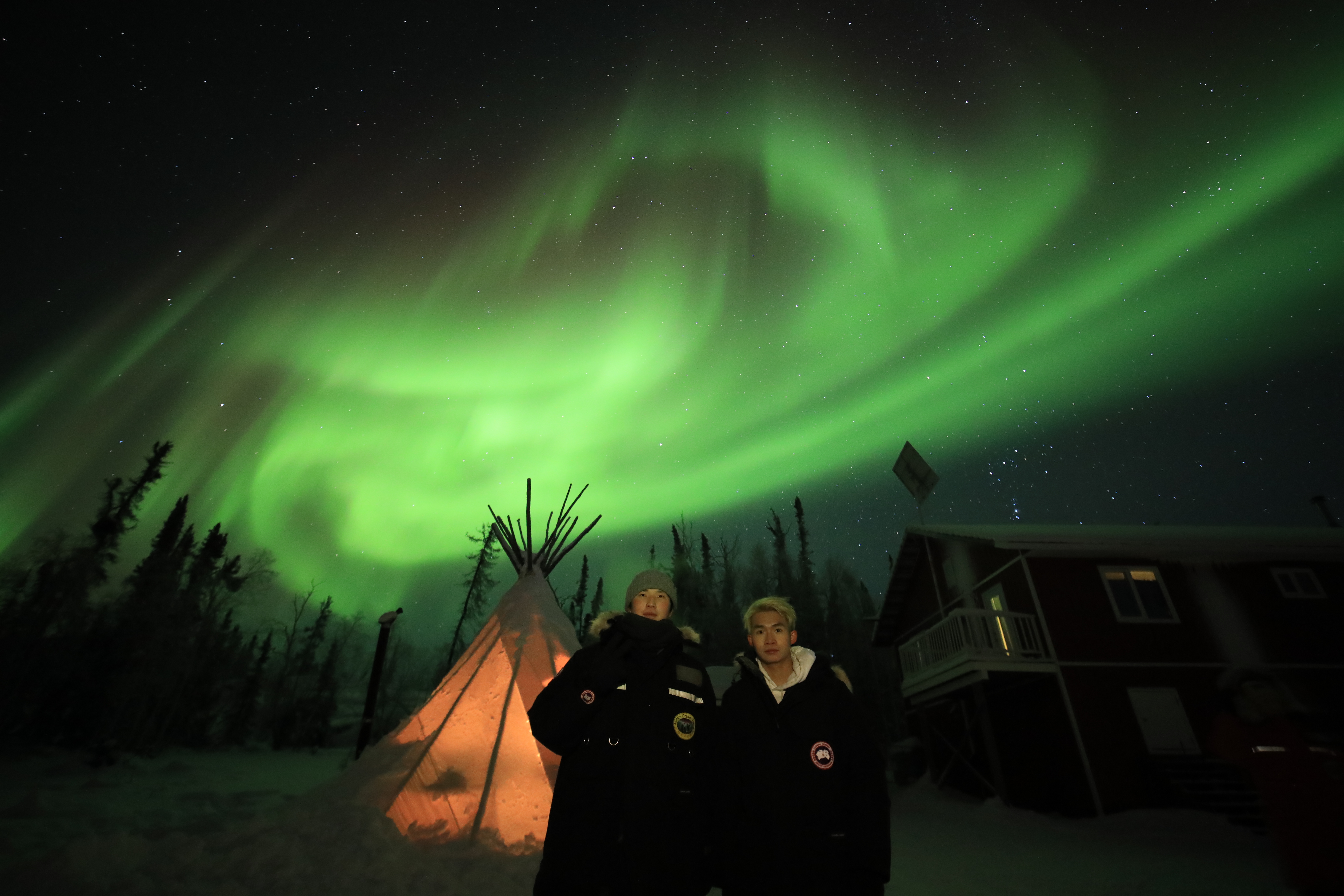 Miklos and I took a photo under the aurora